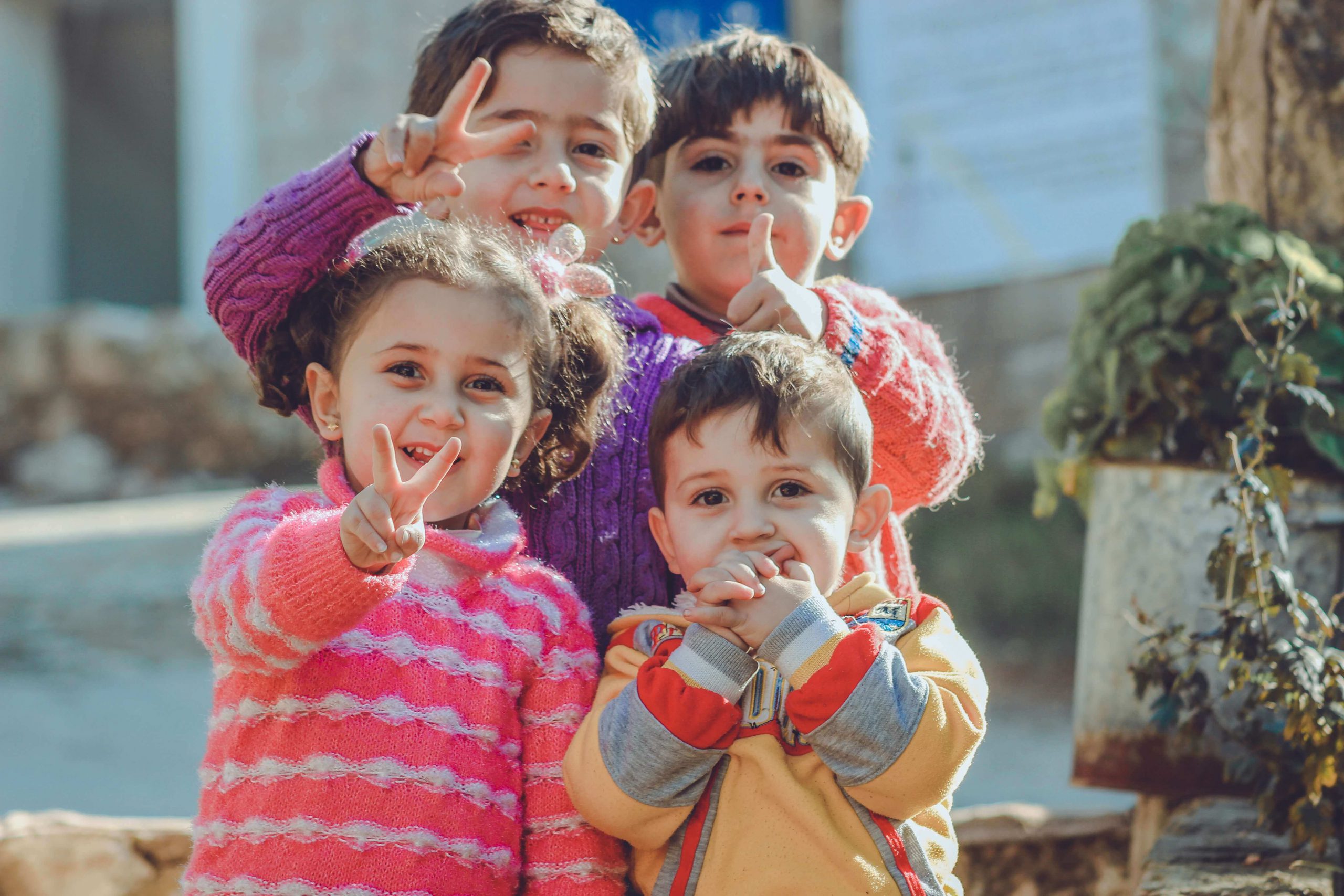 four-children-posing-for-camera