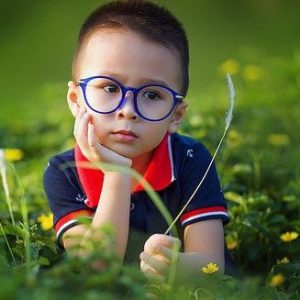 Boy in glasses for sight saving month Boy in glasses for sight saving month